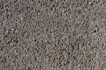 OLD SURFACE OF  ROUGH ASFALT WITH SMAL STONES, BACKGROUND