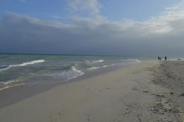 Kota Beach on Bantayan Island, Cebu, Philippines. Overcast day on a long white beach and blue...