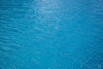 Blue water surface in the swimming pool