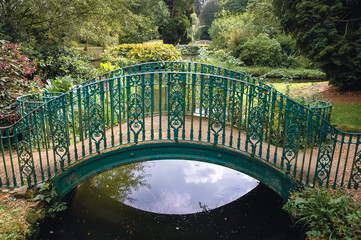 Bridge in Swiss Garden in Old Warden Park located in Biggleswade on the River Ivel in Bedfordshire,...