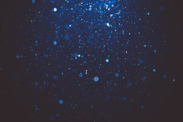 Abstract blue bokeh with black