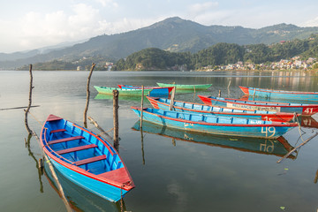 Fototapeta na wymiar Tourist Boats on Phewa Lake in Pokhara Nepal