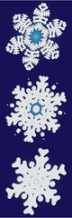 Collection of simple snowflakes on blue background.