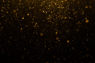 Fototapeta na wymiar Abstract gold bokeh with black