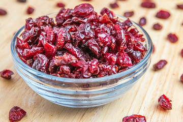 Dried Cranberries In Bowl On Wood