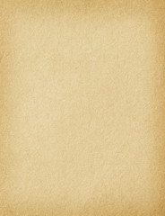 Old vintage paper with a glowing center and grunge vignette.