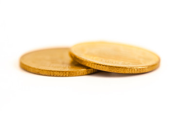 The antique aged golden coin with history on scratch