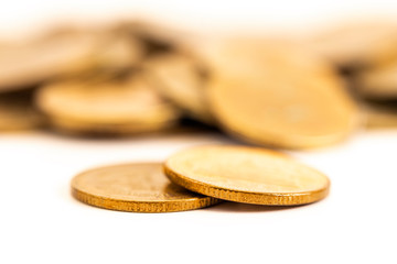 The antique aged golden coin with history on scratch shallow focus