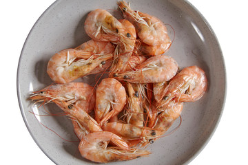 Boiled fresh shrimp on a plate isolated on white background