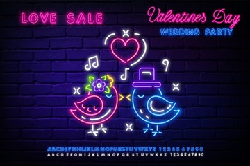 Love birds neon sign. Glowing neon two birds and purple heart on brick wall background. Valentines Day Neon Light Glowing Bright Bird Love and Alphabet Set Neon Yellow Colour Design