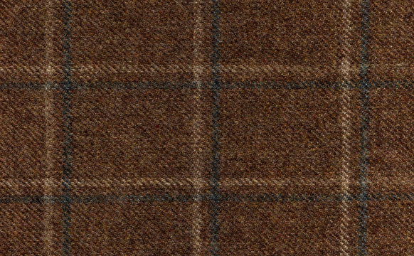 Shades of Brown and grey cashmere fabric. Classic rich tones. Country windowpane tweed riding jacket. Shetland wool. Expensive men's suit fabric. High resolution