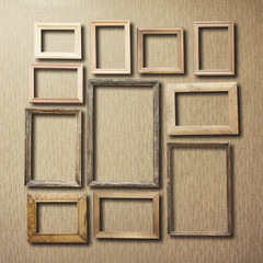 Fototapeta premium old photo frames on retro wallpaper