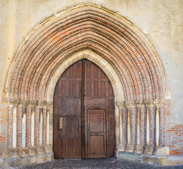 Fototapeta na wymiar Entrance of the cathedral in the French town Rimont