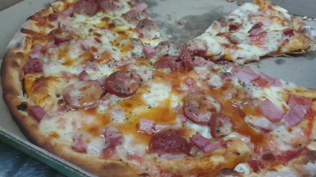 Extra topping of cheese on this pizza is not good enough and needs more hot peppadew chili sauce on top of it to make it even more delicious.