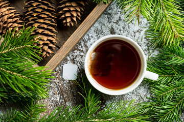 Cup of tea with forest decorations. Selective focus. Shallow depth of field.