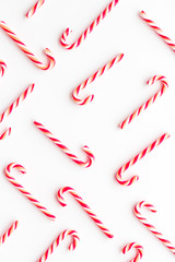 Christmas candy cane pattern on white background top-down