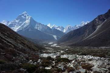 Everest trek, Way down from Dughla to Pheriche with view of Ama Dablam mountain. Himalayas, Nepal