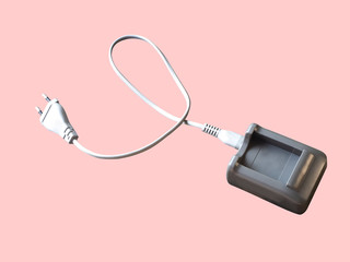 Battery charger brown box. On a pink background,with clipping path