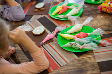 Master class on baking and painting gingerbread. Gingerbread cookies are the making process.