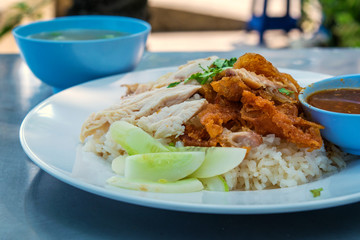 Rice, fried chicken, boiled chicken, put on the table and soup