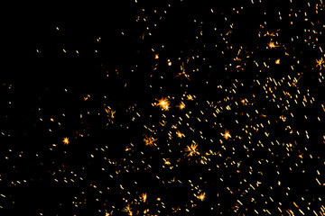 sparks of lights on a black background
