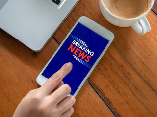 Breaking news online on smartphone.