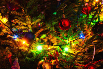 Christmas tree decorations. Red and blue  Ball on the spruce. New Year and Christmas background