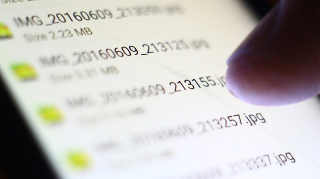 Browsing jpf and other files on a mobile phone. Macro photo.