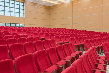 Conference room with red seats.