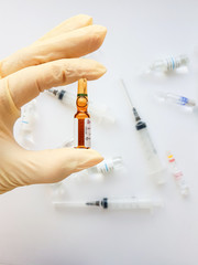 Pharmaceuticals. Antibiotics, syringes, ampoules on a white background.