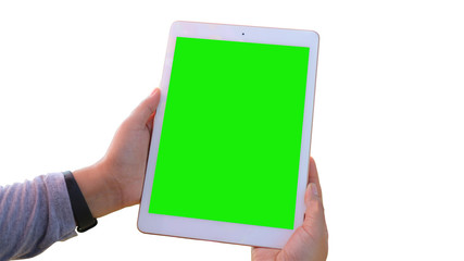 One hand holding a Tablet PC, green screen in a white background 