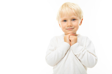 portrait of a charming blond boy in a white t-shirt on a white background
