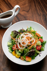 fresh organic mixed vegetable vegan Garden Salad with Vinaigrette sauce