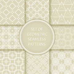 Compilation of seamless patterns. White abstract and geometric prints on olive green background