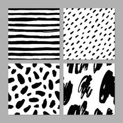 Abstract simple seamless background set with hand drawn elements in black. Trendy monochrome seamless patterns.