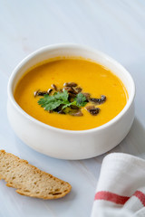 Homemade Thai Sweet Potato Soup with Cilantro, Coconut Milk Cream, Lime and Mushrooms.