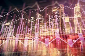 Fototapeta na wymiar Financial chart on city scape with tall buildings background multi exposure. Analysis concept.