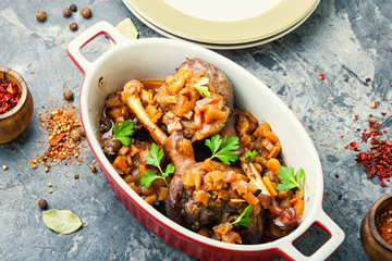 Duck legs in a baking dish