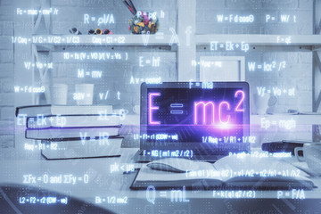 Desktop computer background and formula hologram writing. Double exposure. Education concept.