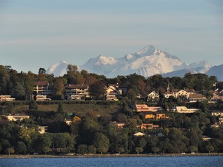 Geneva, Switzerland - October 18th 2019: a Beautiful autumn day in Lake Leman in Geneva. The Lake is surrounded by beautiful mountain that makes the sailing even more spectacular for the many sailors