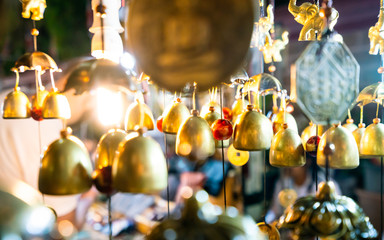 Decorative bells hanging at the Saturday Night Bazaar