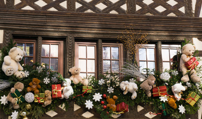 Fototapeta premium traditional Alsace half-timbered house with beautiful Christmas decorations around the windows