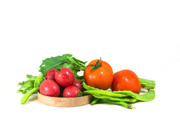 Fresh, healthy vegetables are displayed on white background.