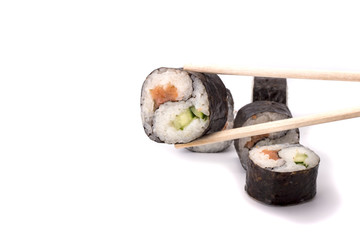 Yin Yang Maki sushi on sticks isolated on white background