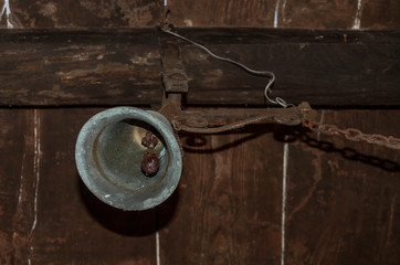 Old antique bell on a chain