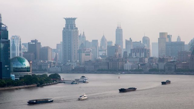 Shanghai embankment Waitan at Huangpu in China timelapse pan up