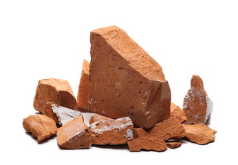 Shattered, broken bricks isolated on white background