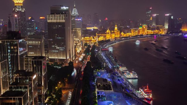 Waitan area of Shanghai on Huangpu river in China timelapse pan up