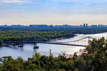 View on pedestrian bridge across the Dnieper river in Kiev, Ukraine