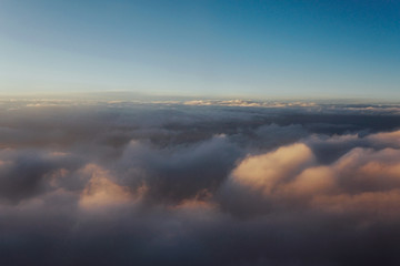 clouds at sunset from iljuminatora plane sky Sun travel